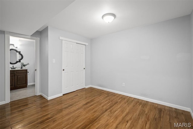 2849 Dardenne Links Dr, Dardenne Prairie, MO 63368 - unfurnished bedroom featuring wood finished floors and a closet