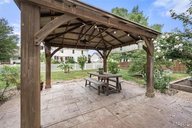 2849 Dardenne Links Dr, Dardenne Prairie, MO 63368 - fenced backyard featuring a patio area, a gazebo, and outdoor dining area