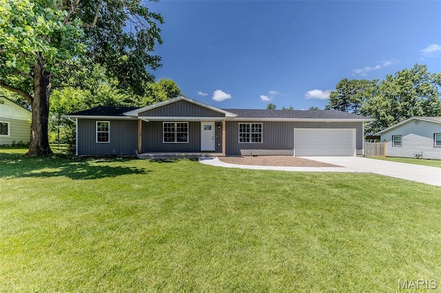 1507 Finn Dr, Lebanon, MO 65536 - ranch-style home with concrete driveway and a garage