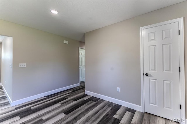 1507 Finn Dr, Lebanon, MO 65536 - unfurnished room with dark wood finished floors and recessed lighting
