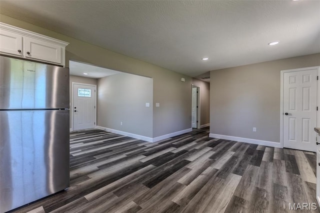 1507 Finn Dr, Lebanon, MO 65536 - unfurnished living room featuring dark wood-style floors and recessed lighting