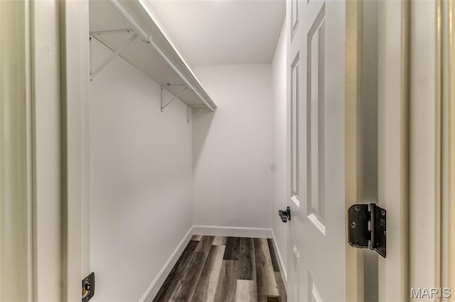 1507 Finn Dr, Lebanon, MO 65536 - spacious closet with dark wood-type flooring