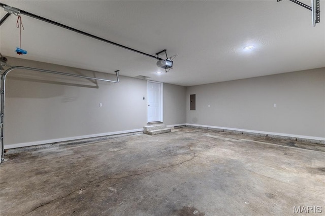 1507 Finn Dr, Lebanon, MO 65536 - garage with a garage door opener and electric panel