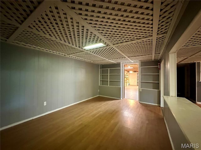918 E 7th St, Rolla, MO 65401 - unfurnished room with wood finished floors and wooden walls