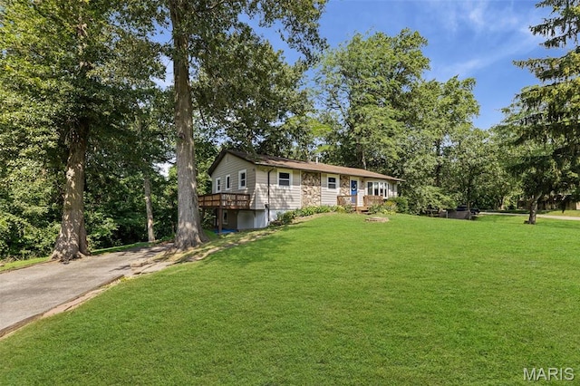 1716 Fountainbleu Dr, Worden, IL 62097 - view of front of house with a front yard, a deck, and driveway