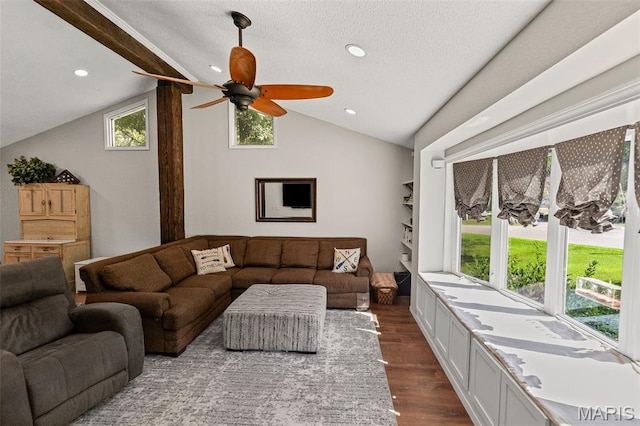 1716 Fountainbleu Dr, Worden, IL 62097 - living room with vaulted ceiling, dark wood-style floors, ceiling fan, recessed lighting, and a textured ceiling