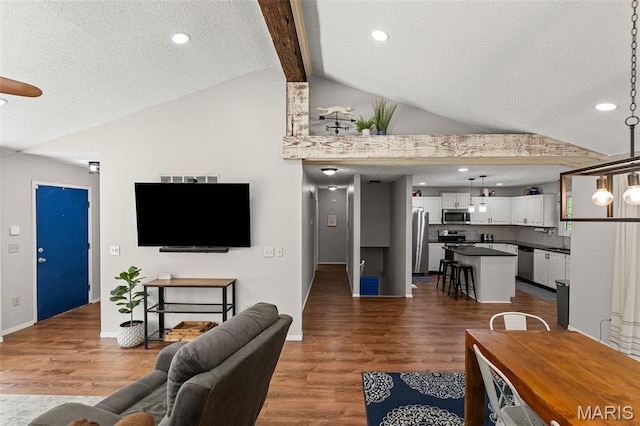 1716 Fountainbleu Dr, Worden, IL 62097 - living area featuring dark wood-style floors, a textured ceiling, and recessed lighting