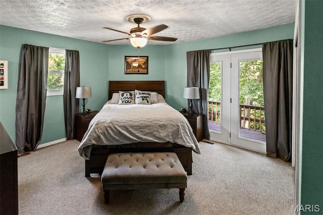 1716 Fountainbleu Dr, Worden, IL 62097 - bedroom featuring access to outside, a textured ceiling, carpet floors, and a ceiling fan