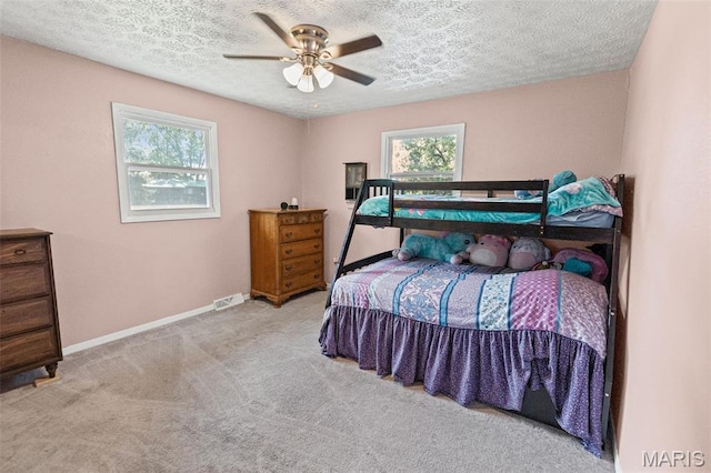 1716 Fountainbleu Dr, Worden, IL 62097 - bedroom with carpet flooring, a textured ceiling, and ceiling fan