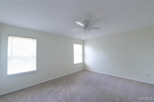 154 Homeshire Dr Unit 27, Wentzville, MO 63385 - spare room with carpet and a ceiling fan