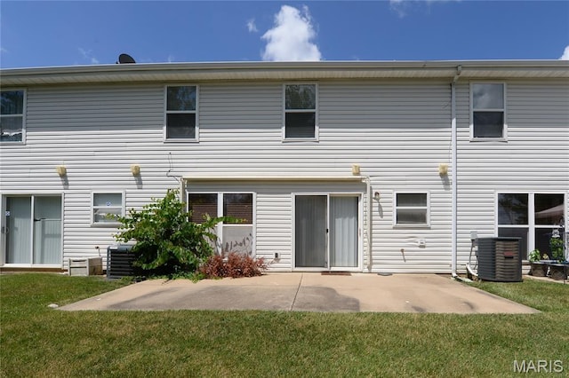 154 Homeshire Dr Unit 27, Wentzville, MO 63385 - back of house with a lawn and a patio area