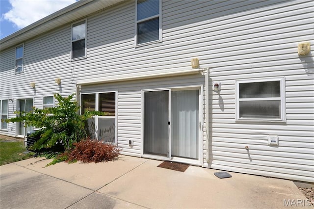 154 Homeshire Dr Unit 27, Wentzville, MO 63385 - rear view of property featuring a patio area