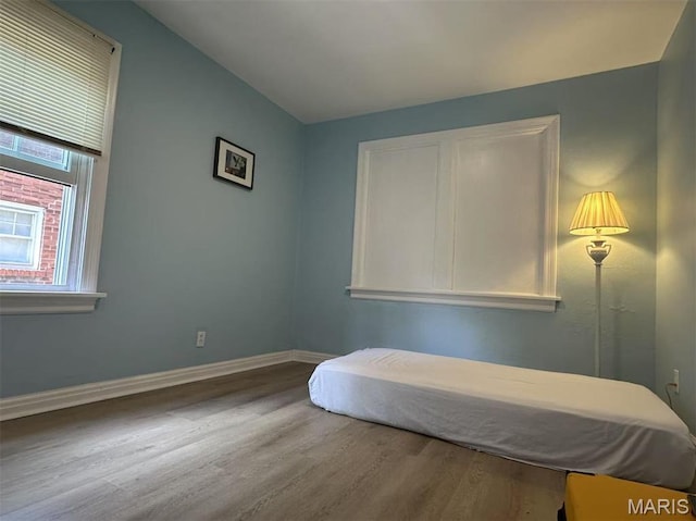 3525 Belaire Pl, Beverly Hills, MO 63121 - bedroom with wood finished floors and baseboards