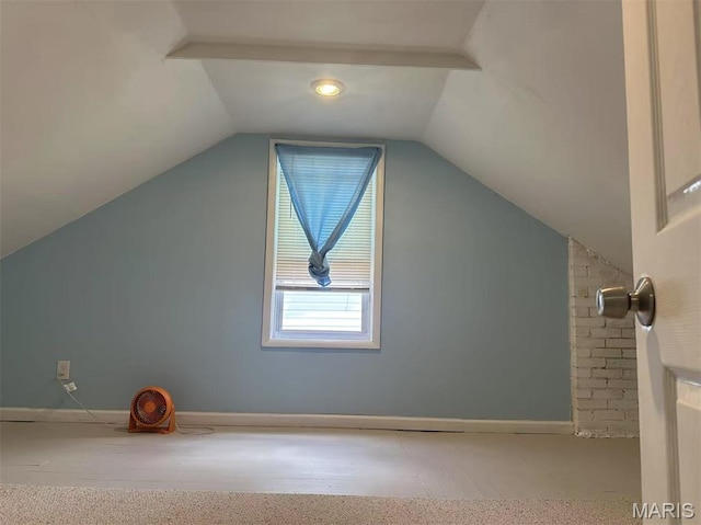 3525 Belaire Pl, Beverly Hills, MO 63121 - additional living space featuring lofted ceiling and baseboards