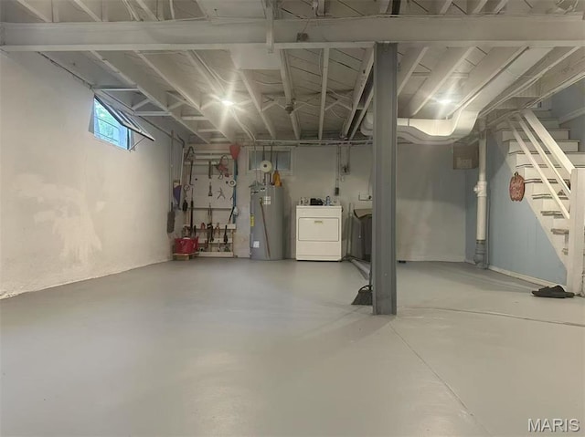 3525 Belaire Pl, Beverly Hills, MO 63121 - below grade area featuring water heater and stairs