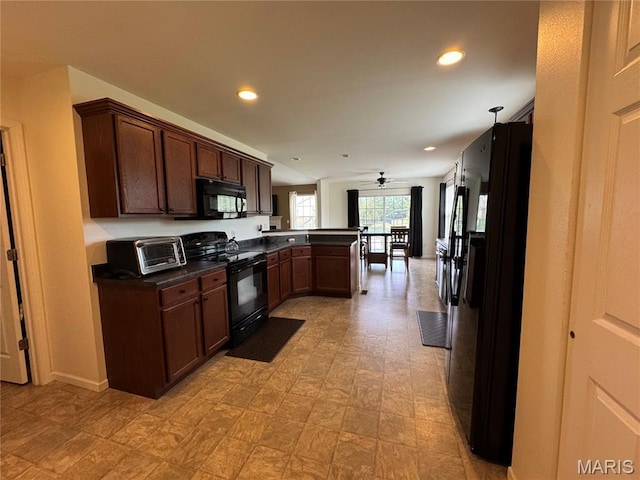 5037 Bristol Hill Dr, Ofallon, IL 62269 - kitchen featuring black appliances, dark countertops, a peninsula, ceiling fan, and recessed lighting
