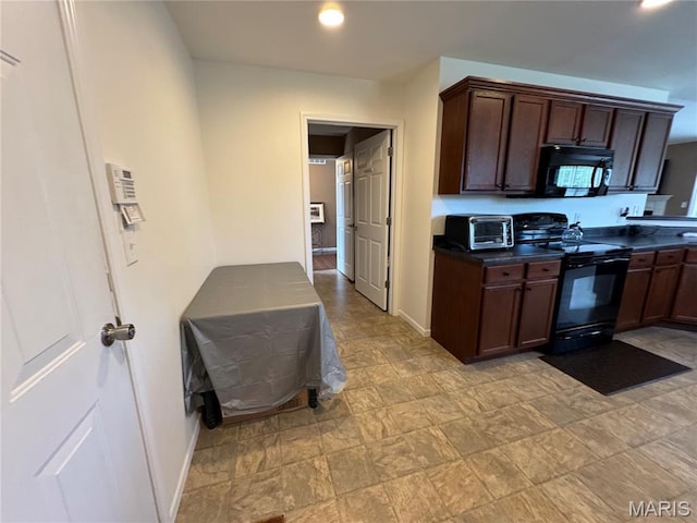 5037 Bristol Hill Dr, Ofallon, IL 62269 - kitchen featuring black appliances, dark countertops, dark brown cabinets, recessed lighting, and stone finish flooring