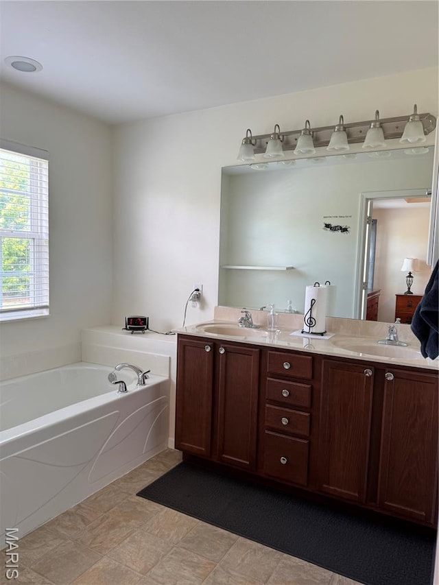 5037 Bristol Hill Dr, Ofallon, IL 62269 - full bathroom featuring double vanity and a bath