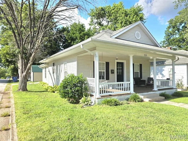 315 W State St, Union, MO 63084 - view of front of property featuring covered porch and a front yard
