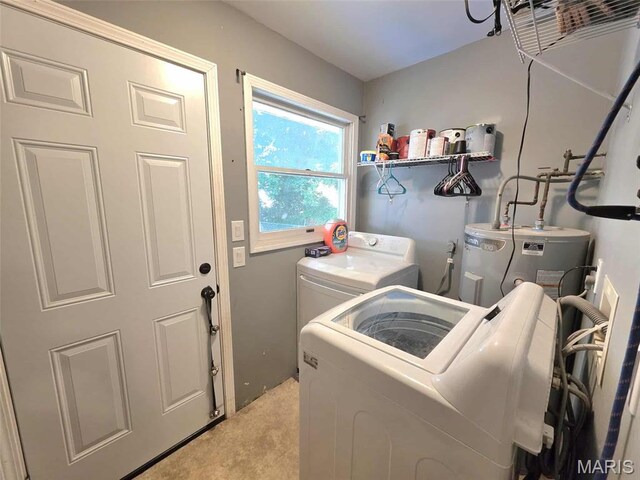 315 W State St, Union, MO 63084 - laundry room with washing machine and clothes dryer, electric water heater, and light carpet