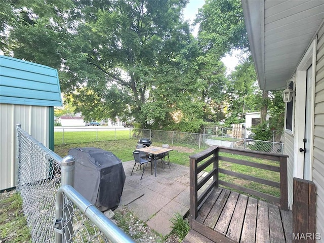 315 W State St, Union, MO 63084 - wooden terrace with a fenced backyard, outdoor dining space, area for grilling, and a patio area