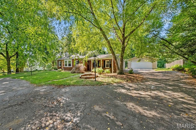 100 Calverton Rd, Saint Louis, MO 63135 - view of front of property featuring driveway