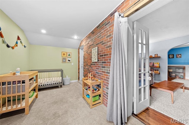 100 Calverton Rd, Saint Louis, MO 63135 - bedroom with brick wall, arched walkways, and carpet flooring