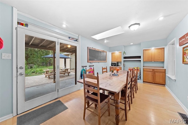 100 Calverton Rd, Saint Louis, MO 63135 - dining room with a skylight and light wood-type flooring