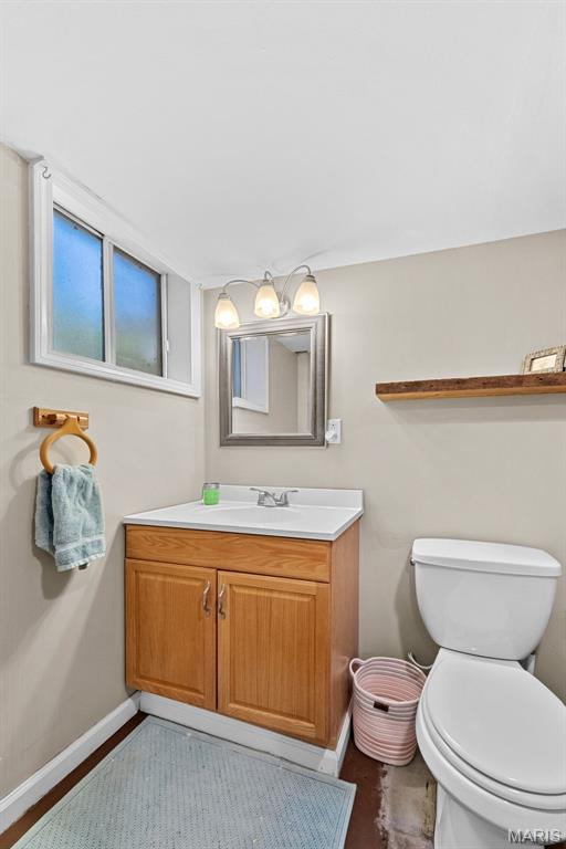 100 Calverton Rd, Saint Louis, MO 63135 - bathroom featuring toilet and vanity