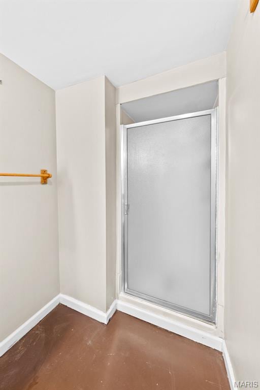 100 Calverton Rd, Saint Louis, MO 63135 - bathroom featuring a shower stall and finished concrete flooring