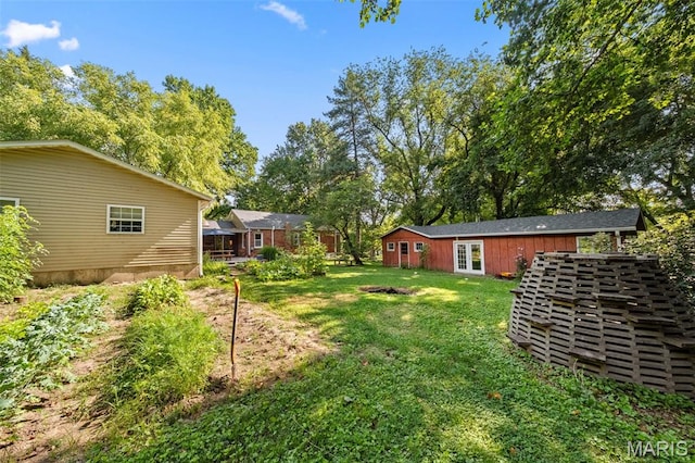 100 Calverton Rd, Saint Louis, MO 63135 - view of green lawn featuring french doors and view of scattered trees