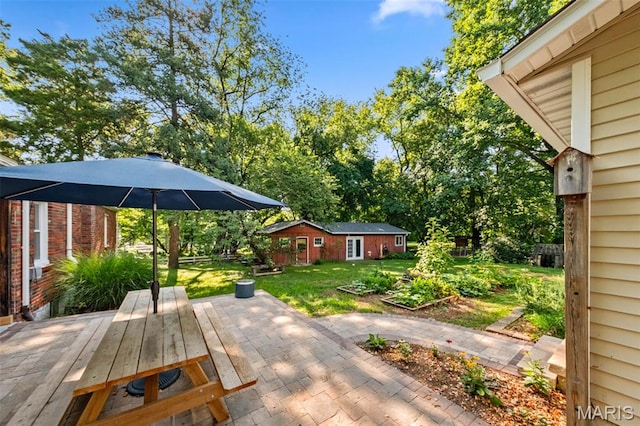 100 Calverton Rd, Saint Louis, MO 63135 - wooden deck with an outdoor structure and a patio