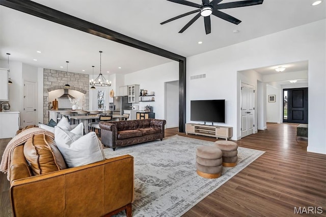 213 Bluegrass Pasture Ct, Wentzville, MO 63385 - living area featuring a ceiling fan, dark wood-style floors, recessed lighting, and a chandelier