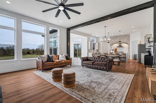 213 Bluegrass Pasture Ct, Wentzville, MO 63385 - living area with ceiling fan, dark wood finished floors, a chandelier, recessed lighting, and beamed ceiling