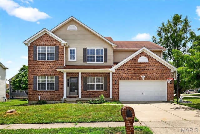 621 Royal Crest Way, Ofallon, IL 62269 - traditional-style house featuring a front yard, concrete driveway, an attached garage, and brick siding