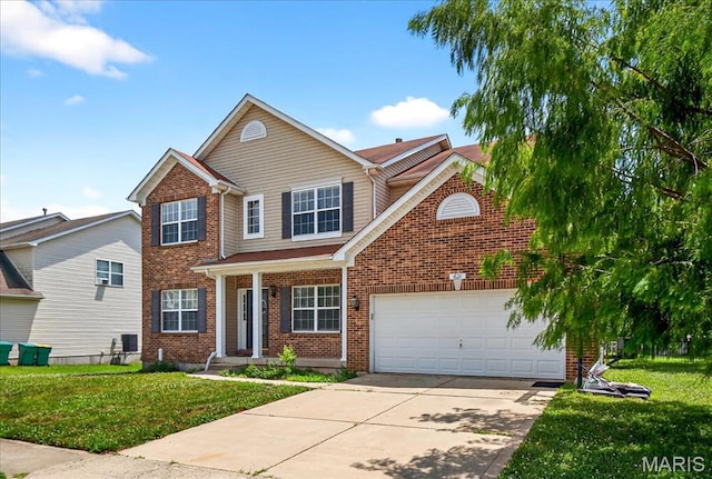 621 Royal Crest Way, Ofallon, IL 62269 - traditional home featuring concrete driveway, a front yard, a garage, and brick siding
