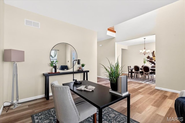 621 Royal Crest Way, Ofallon, IL 62269 - dining area with light wood-style flooring and a chandelier