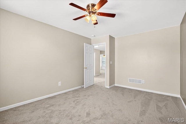 621 Royal Crest Way, Ofallon, IL 62269 - spare room featuring a ceiling fan and carpet