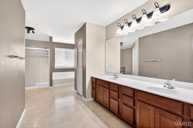 621 Royal Crest Way, Ofallon, IL 62269 - bathroom with a garden tub, double vanity, a shower stall, and tile patterned flooring