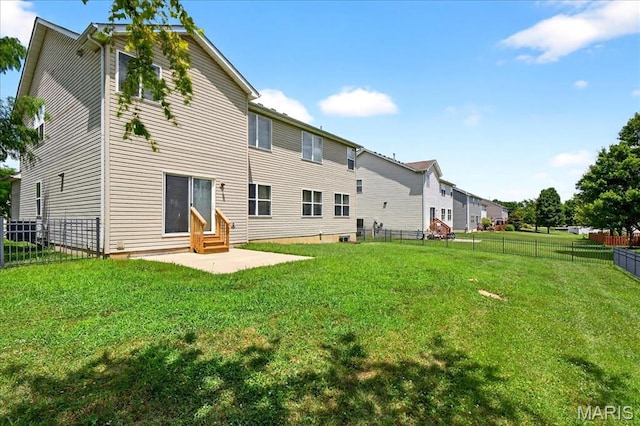 621 Royal Crest Way, Ofallon, IL 62269 - back of property featuring a fenced backyard, a patio area, and entry steps