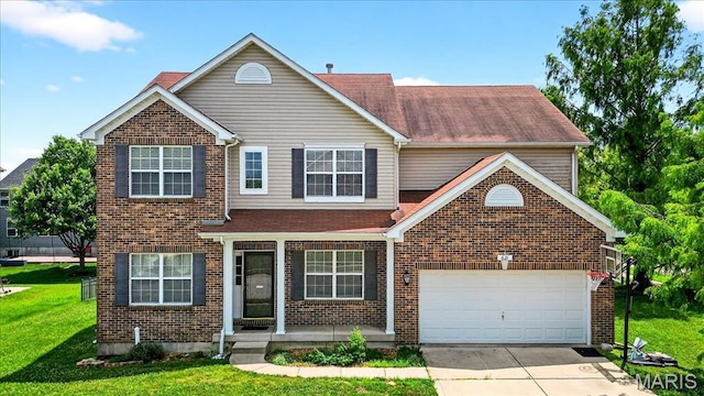 621 Royal Crest Way, Ofallon, IL 62269 - traditional-style home with brick siding, concrete driveway, a front yard, and an attached garage