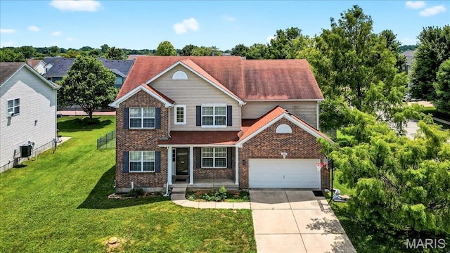 621 Royal Crest Way, Ofallon, IL 62269 - traditional home featuring driveway, brick siding, and a front lawn