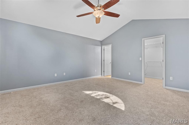 1817 Partridge Pl, Edwardsville, IL 62025 - unfurnished bedroom featuring vaulted ceiling, carpet, a walk in closet, and ceiling fan