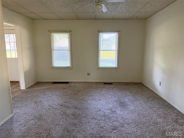 913 W Edwards St, Vandalia, IL 62471 - carpeted spare room with a ceiling fan and a drop ceiling