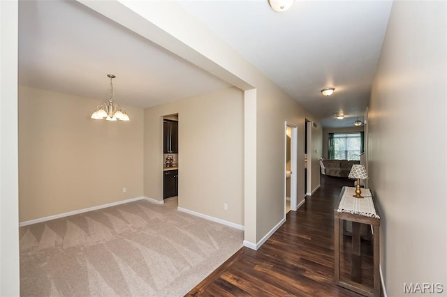 510 Newkirk Cir, Saint Charles, MO 63303 - hallway with a chandelier and wood finished floors