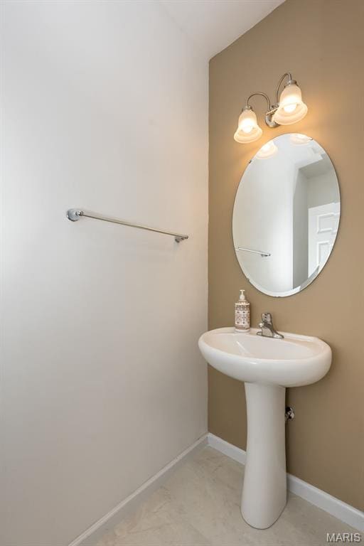 510 Newkirk Cir, Saint Charles, MO 63303 - bathroom with baseboards and a sink