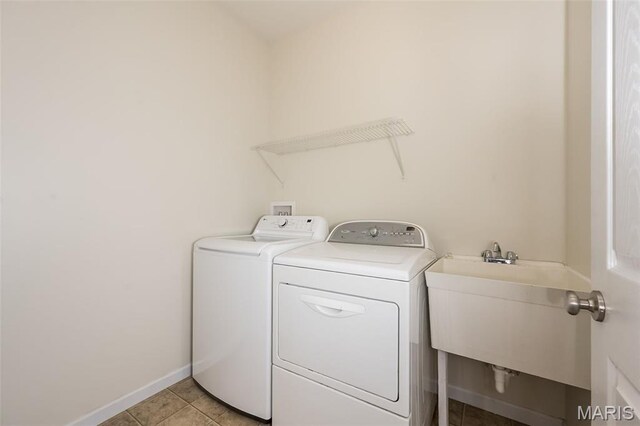 510 Newkirk Cir, Saint Charles, MO 63303 - washroom featuring independent washer and dryer and light tile patterned floors