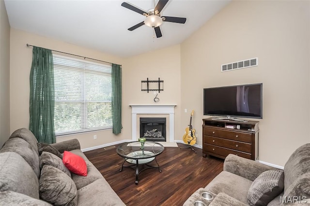 510 Newkirk Cir, Saint Charles, MO 63303 - living room featuring lofted ceiling, ceiling fan, wood finished floors, and a glass covered fireplace