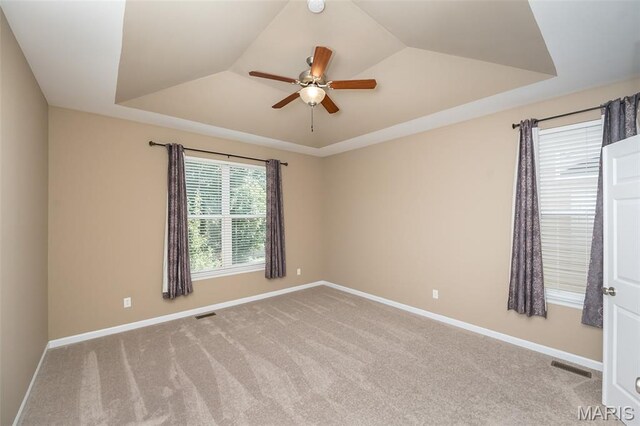 510 Newkirk Cir, Saint Charles, MO 63303 - carpeted spare room with a ceiling fan and a raised ceiling