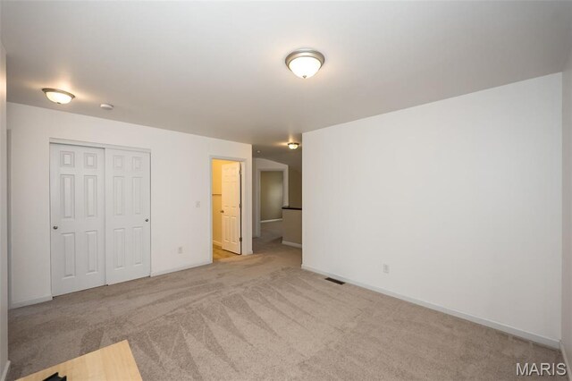 510 Newkirk Cir, Saint Charles, MO 63303 - unfurnished bedroom with light colored carpet and a closet